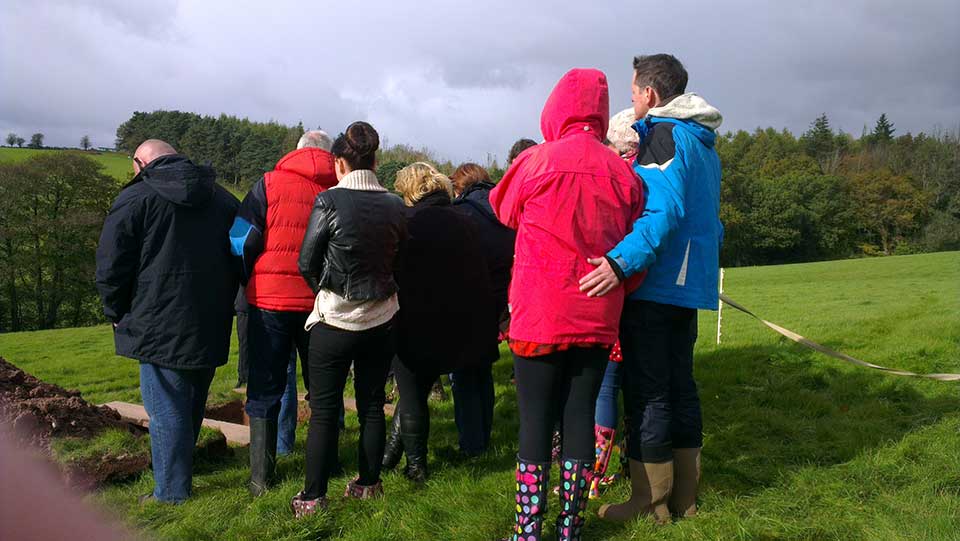 Small funeral gathering